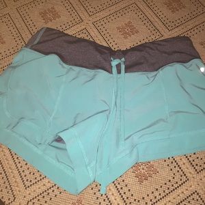 Teal & black swimming shorts